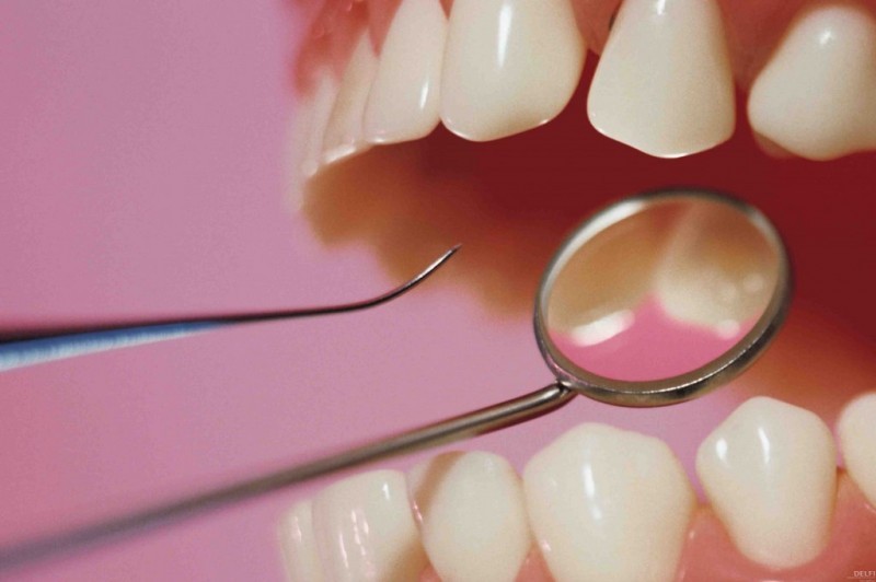 Разрушение зубов: причины, диагностика, симптомы и лечение